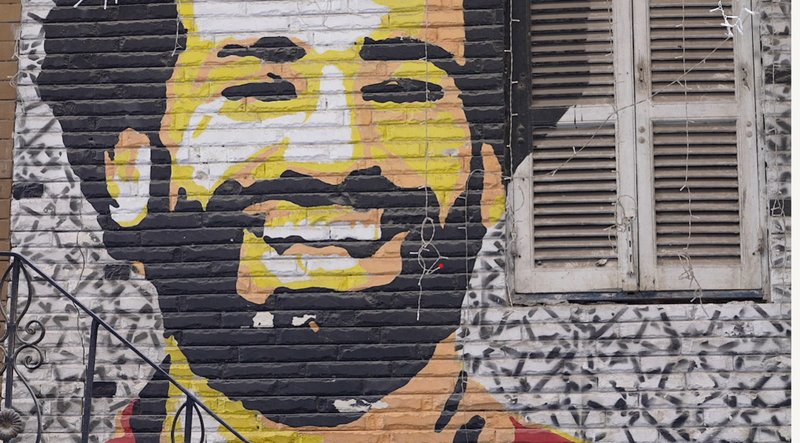 A mural of Liverpool and Egypt winger Mohamed Salah outside a cafe in Cairo