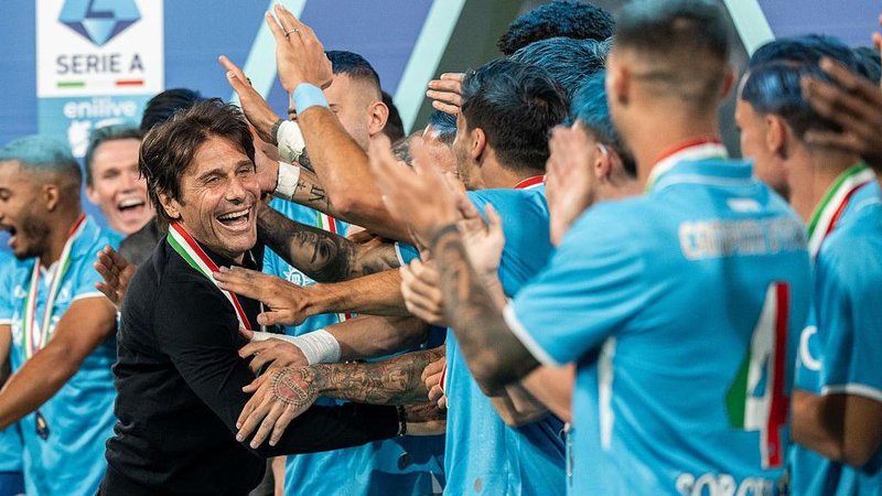 Antonio Conte celebrates winning the Scudetto with Napoli