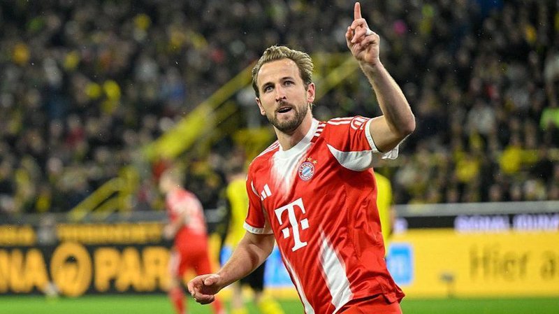 Harry Kane celebrates scoring in Bayern Munich's 3-2 win against Borussia Dortmund in February
