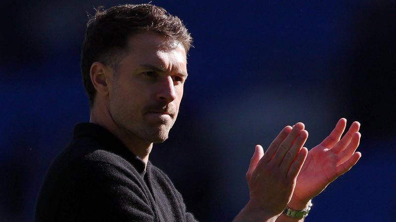 Aaron Ramsey applauds fans after a Cardiff game