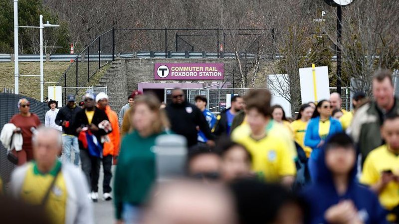 Fans depart Foxboro Station ahead of the recent friendly between Brazil and France