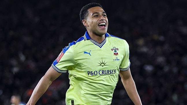 Shea Charles celebrates scoring against Arsenal