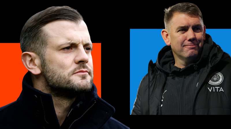 Jack Wilshere, wearing a black coat with a high collar, looks on with a serious face (left). Dave Challinor, wearing a black jacket with a Stockport county badge on, smiles (right).