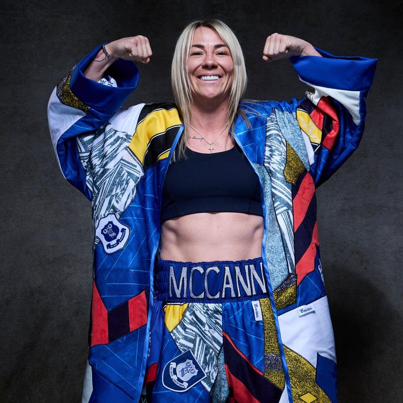 McCann is shown wearing her Everton kit for her fight this weekend, which was made using old Everton shirts as well as flags and banners from past derby games. She is nicknamed 'Meatball' because she used to work at Subway to pay the bills when she started out as an amateur MMA fighter. She will make her Liverpool boxing debut on Saturday and, so far, she has won all three of her professional fights since her switch from UFC