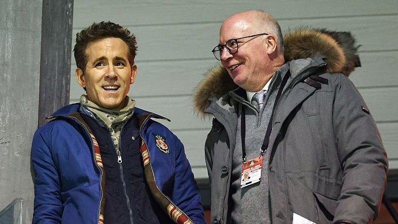 Wrexham's co-chairman Ryan Reynolds (left) and director Shaun Harvey (right)