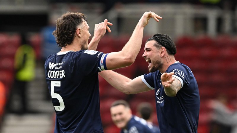 Millwall's Jake Cooper and Tristan Crama celebrate after winning away to Middlesbrough