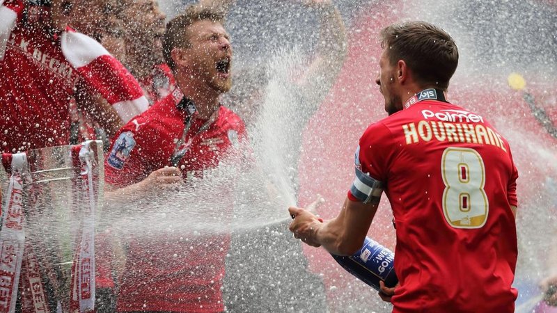 Conor Hourihane sprays team-mates with champagne following the 2016 League One play-off final