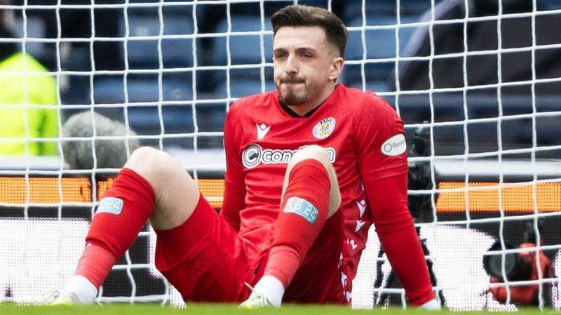 St Mirren goalkeeper Ryan Mullen sits down injured at Hampden Park