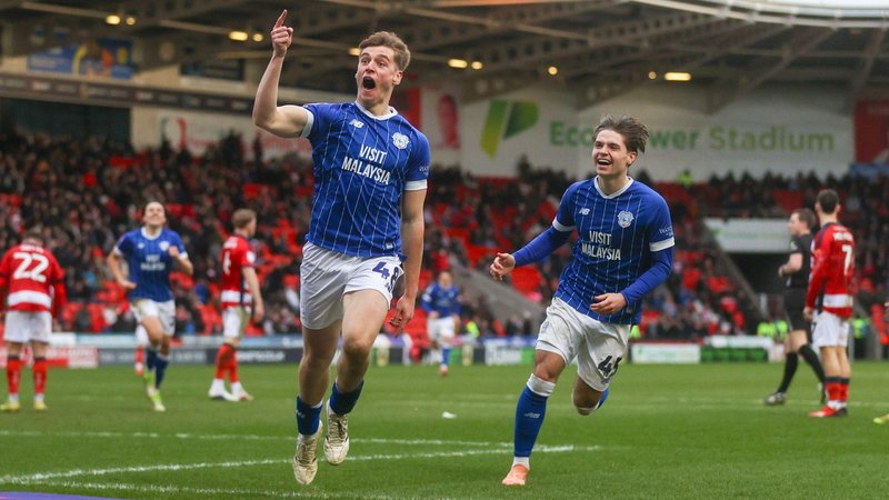 Dylan Lawlor celebrates scoring with arm raised