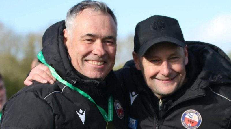 Nuneaton Town management duo Darren Acton and Russell Dodd celebrate winning promotion 