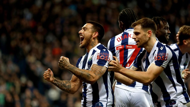 West Brom players celebrate a win