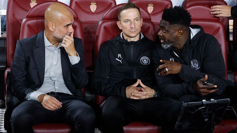 Coach of Manchester City Pep Guardiola, assistant-coaches Pepijn Lijnders and Kolo Toure during the UEFA Champions League 2025/26 League Phase MD2 football match between AS Monaco