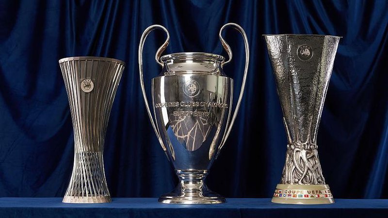 A group photo of the trophies for the Uefa Conference League, Uefa Champions League and Uefa Europa League
