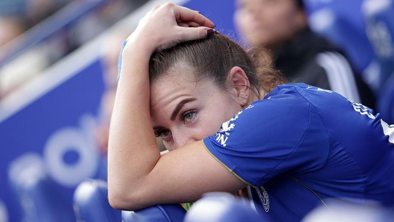 Shannon O'Brien holds her head