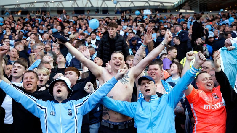 Coventry fans during the game at Blackburn which clinched promotion