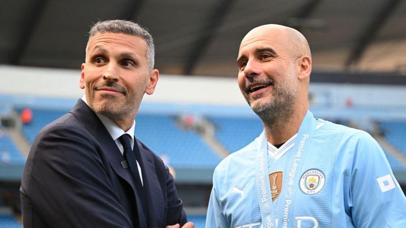 Al Mubarak and Pep Guardiola smiling