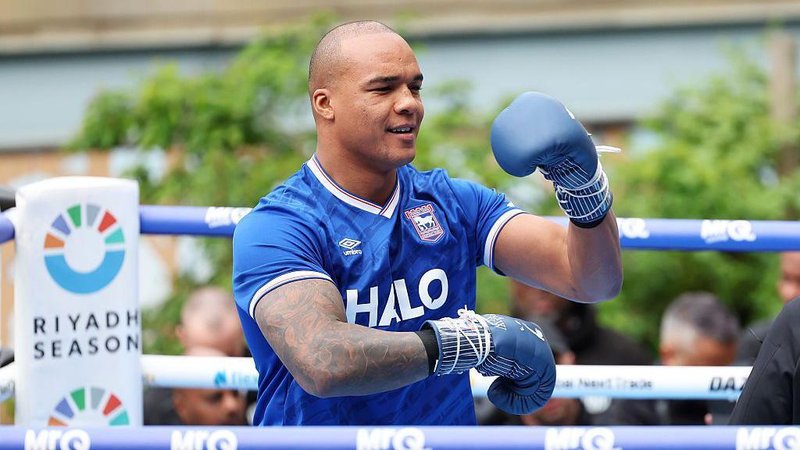 World champion boxer Fabio Wardley wears an Ipswich Town shirt during his Media workout in Manchester before Saturday's fight with Daniel Dubois.