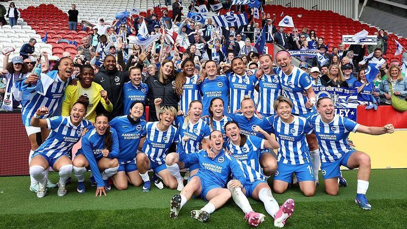 The players of Brighton & Hove Albion pose for a photo after the team's victory in the Adobe Women's FA Cup Semi Final match between Liverpool and Brighton