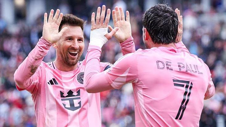 Lionel Messi celebrates with Rodrigo de Paul after scoring for Inter Miami at Toronto in May 2026