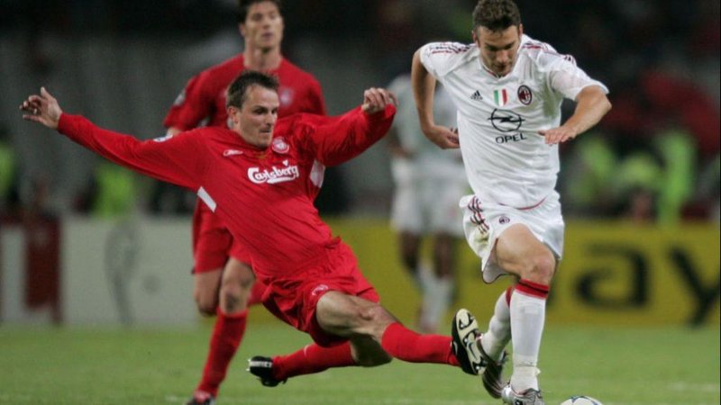 Liverpool midfielder Dietmar Hamann fights for the ball with AC Milan forward Andriy Shevchenko, whilst Liverpool midfielder Xabi Alonso chases behind - 2005 Champions League final.