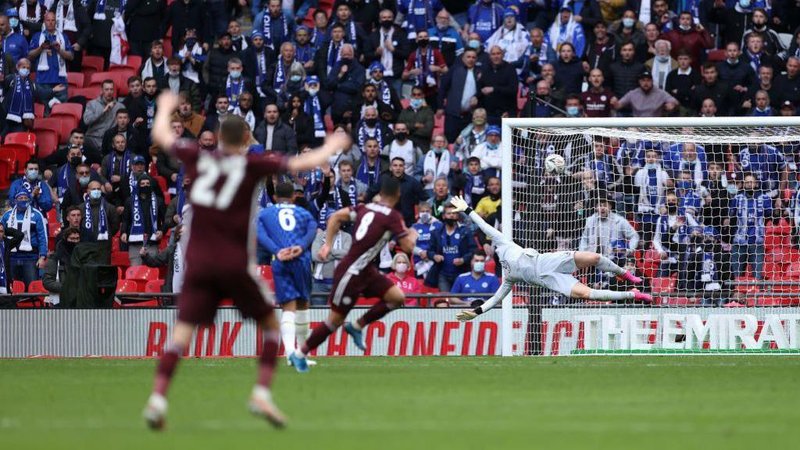Youri Tielemans begins to wheel away as he scores