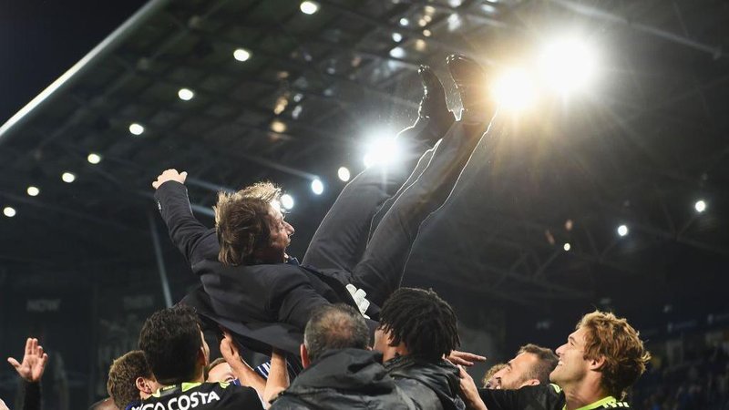 Chelsea boss Antonio Conte is pictured being given 'the bumps' by his players after his Chelsea side beat the Baggies at The Hawthorns to clinch the Premier League title in 2017. The celebrations continued long into the night.