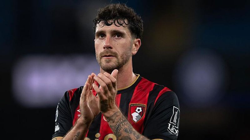 Marcos Senesi applauds Bournemouth fans after a game at Manchester City in November 2025