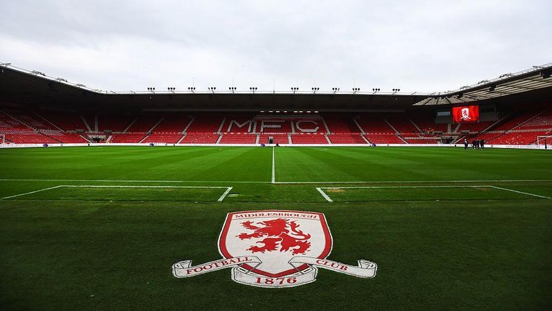 A view of the Riverside Stadium with Middlesbrough's badge on the artificial matting in front of the pitch