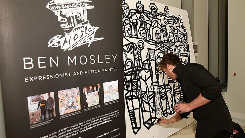 Ben Mosley at the 2014 Fifa World Cup McDonald's launch party in New York City creating a painting.