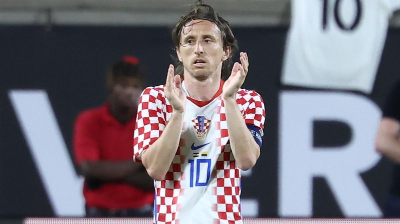 Luka Modric claps at the end of a match for Croatia