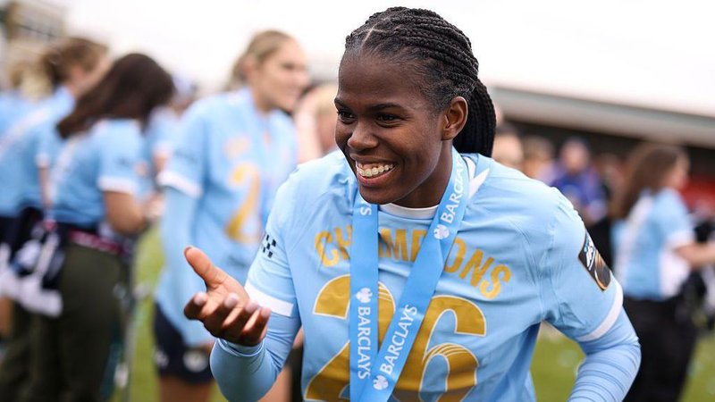 Khadija Shaw celebrates Manchester City's WSL title win