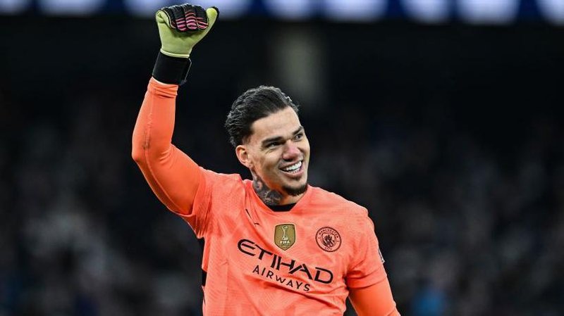 Manchester City Goalkeeper Ederson smiles after Manchester score their fourth goal during the Premier League match between Manchester City FC and Newcastle United FC at Etihad Stadium on February 15, 2025